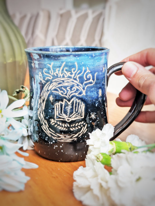 Carefully carved Book of Stars Mug